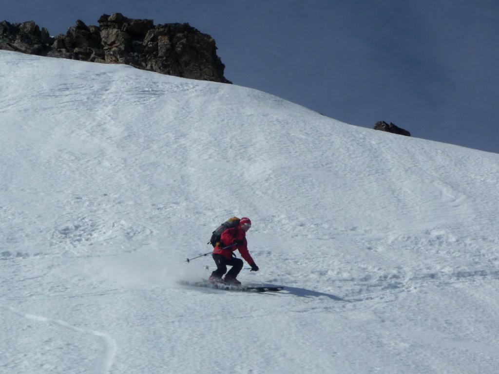 Descente dans la pente sommitale