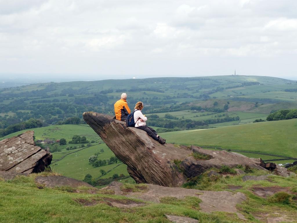 Hikers resting on a rock on the north ridge