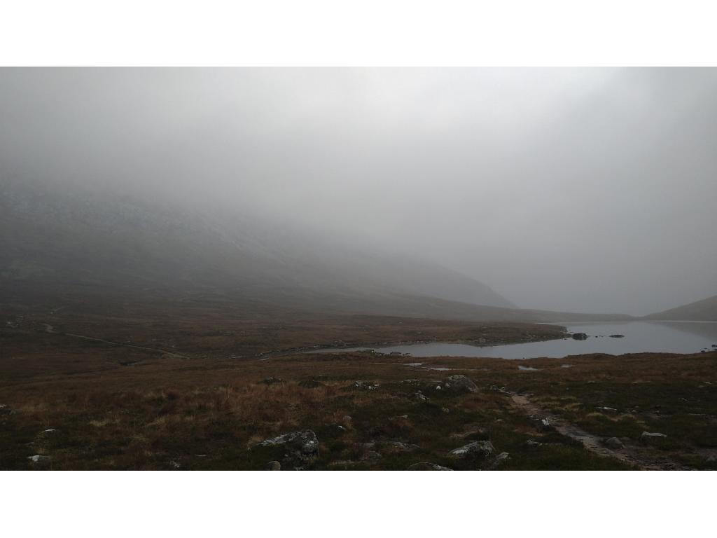 It starts raining at Lochan Meall an t-Suidhe.