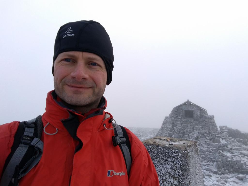 On the summit cairn