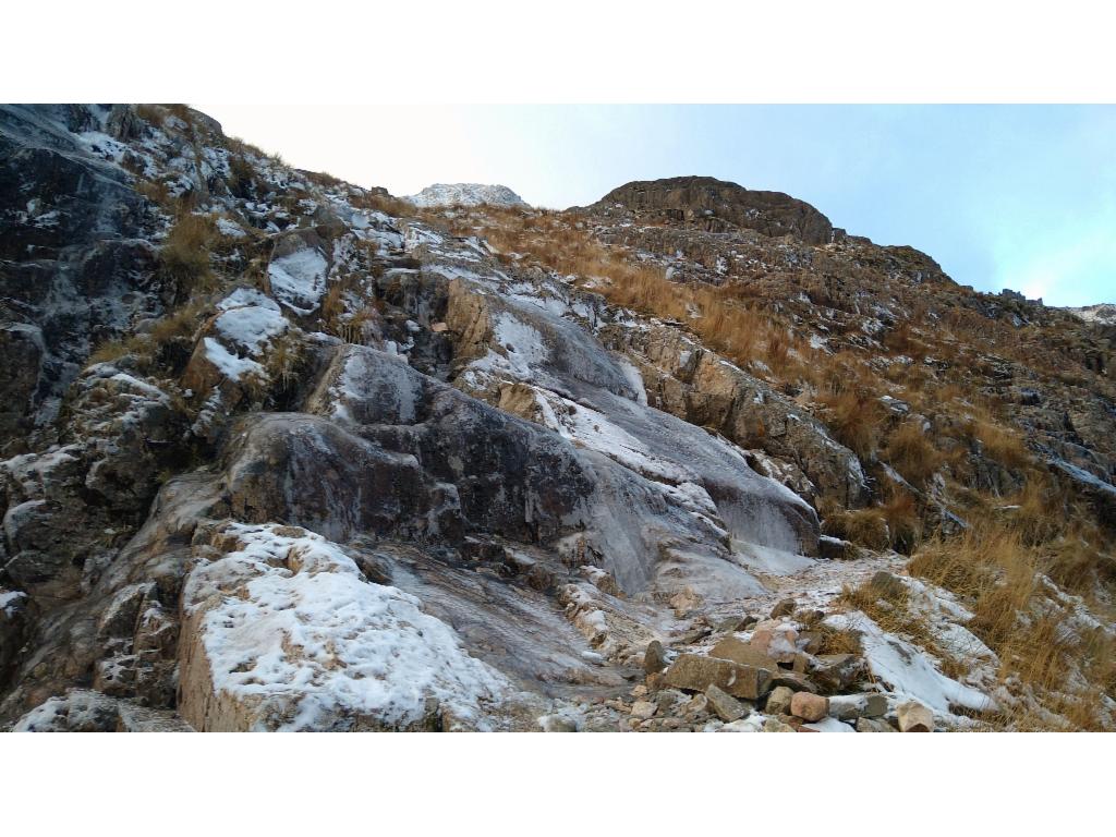 Scrambling over icy rocks towards the little lakes