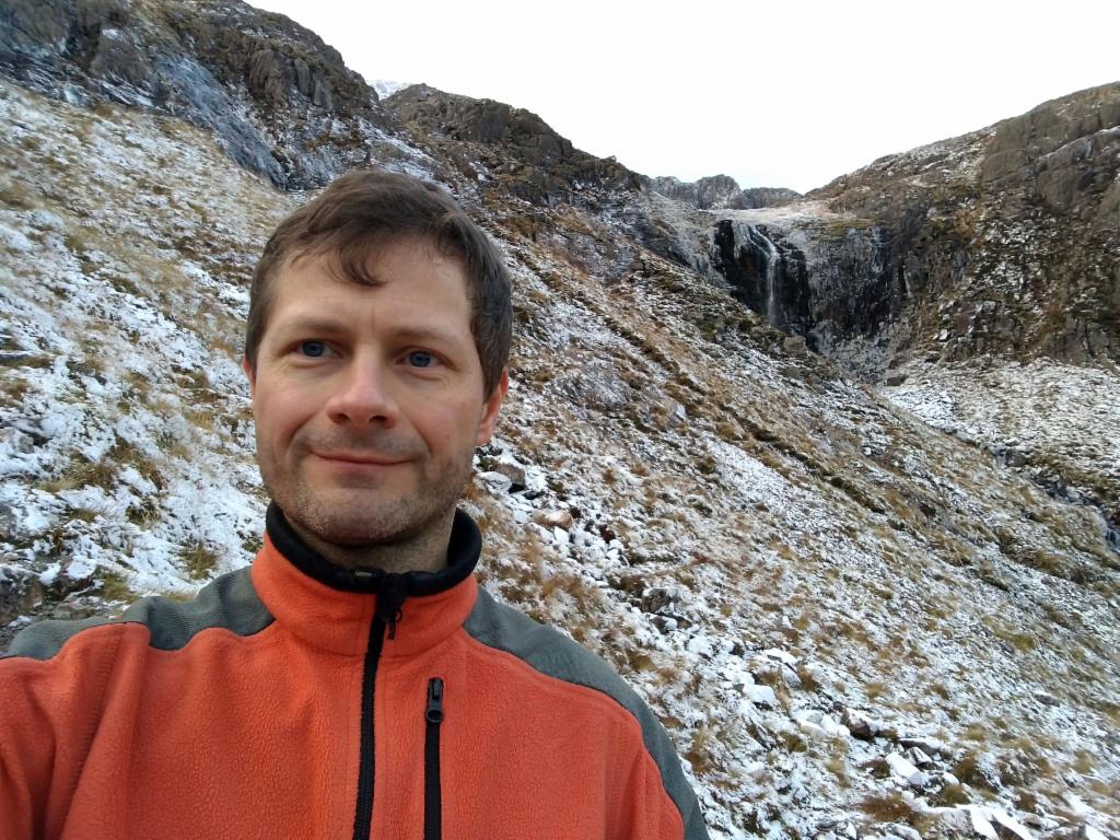Brief break below the waterfall