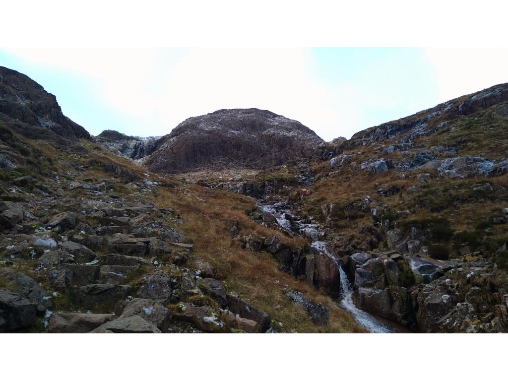 Towards the rocky barrier below the little lakes